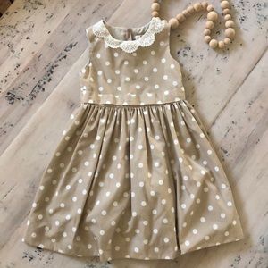 Girls’ tan and cream dress